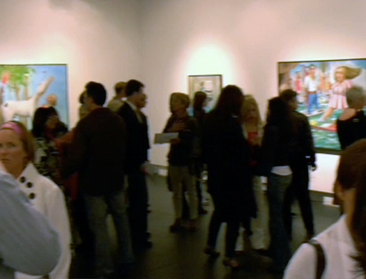 photo of a crowded gallery at the opening of canadian artist Michael Abraham