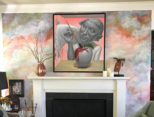Original oil painting titled 'pleasure in heaven' by Michael Abraham, hangs over white fire places on pink walls