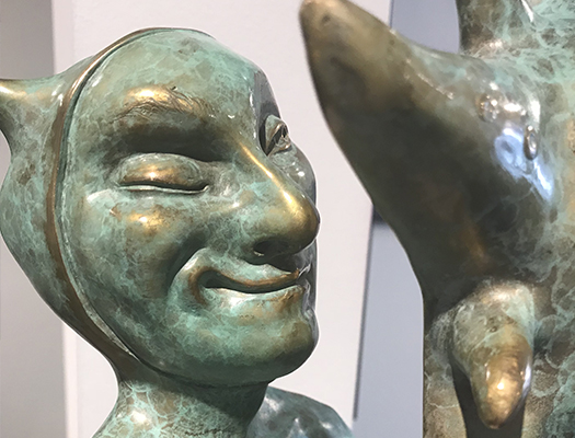 Close up of satry and sunshine bronze sculpture by canadian artist Michael Abraham
