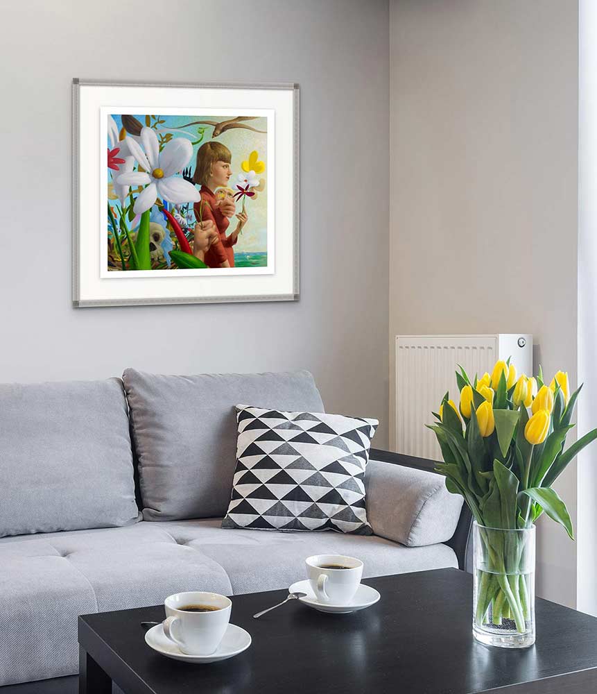 Photo of a warm grey living room with yellow flowers and an art print on the wall titled 'memento mori'